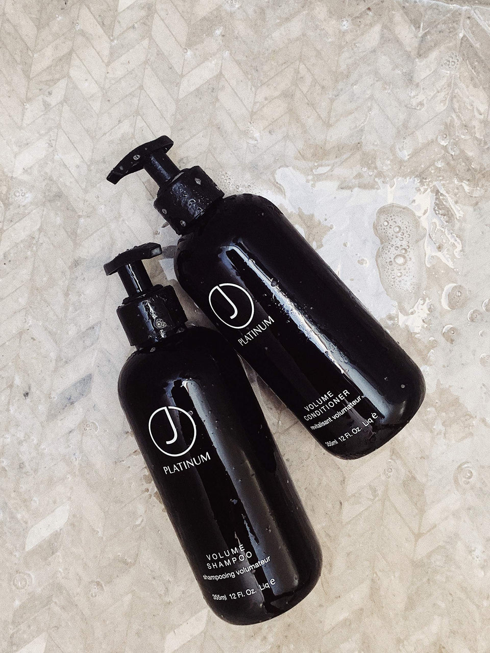 J Beverly Hills Platinum Volume Conditioner texture closeup reveals smooth, creamy formula for detangling.
