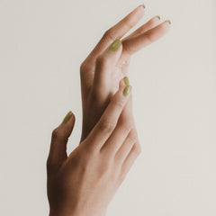 Nails painted with J. Hannah earthy chartreuse green for midcentury chic style