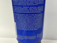 Jack Black Blue Midnight in a shower scene, dual cleanse for body and hair.