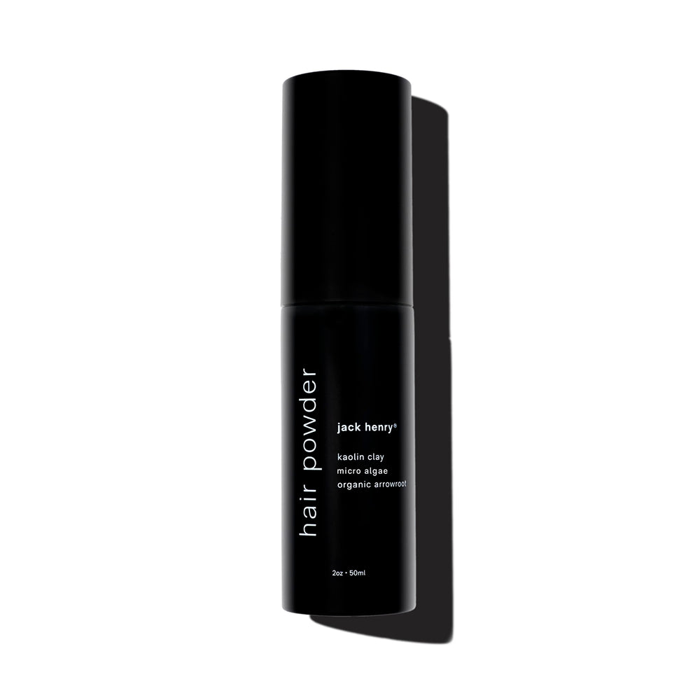 Jack Henry dry shampoo powder unscented bottle demonstrates fragrance-free oil control in everyday use