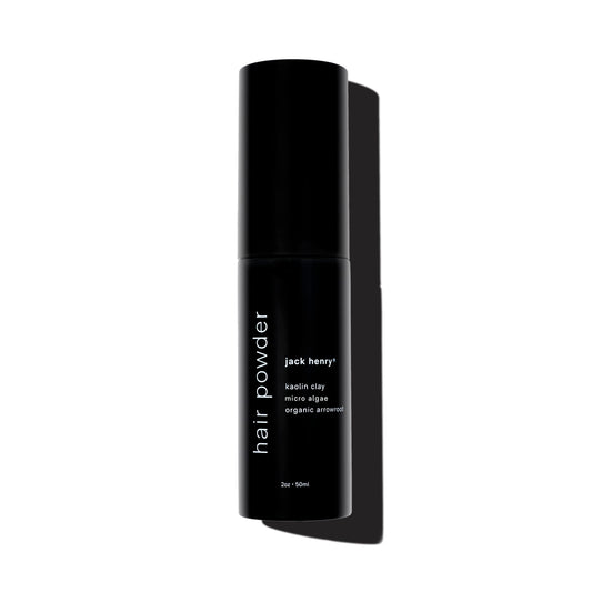 Jack Henry dry shampoo powder unscented bottle demonstrates fragrance-free oil control in everyday use