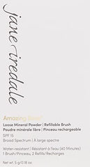 Jane Iredale Amazing Base loose mineral powder being buffed on skin for luminous finish.