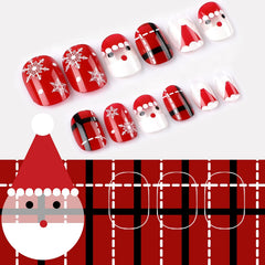 JANYUN Santa-design nails offer playful holiday styling.