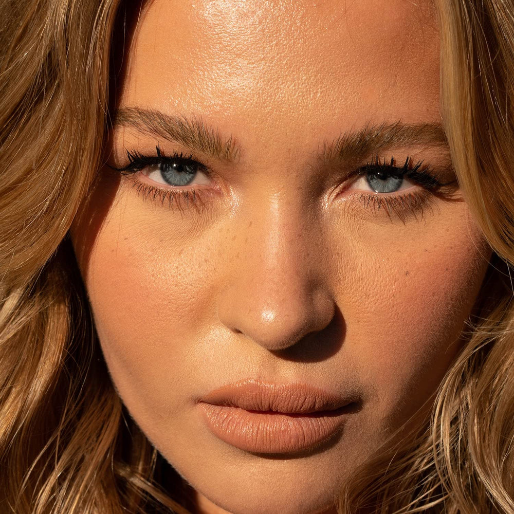 Close-up of Jason Wu Free-Da Brow dual-sided brush for precise shaping