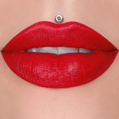 Jeffree Star Velvet Trap Red Affair swatch on skin, bold red pigment