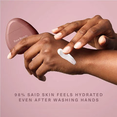 Person applying JIGME CALA R.a.r.e hand cream for comforting moisture.