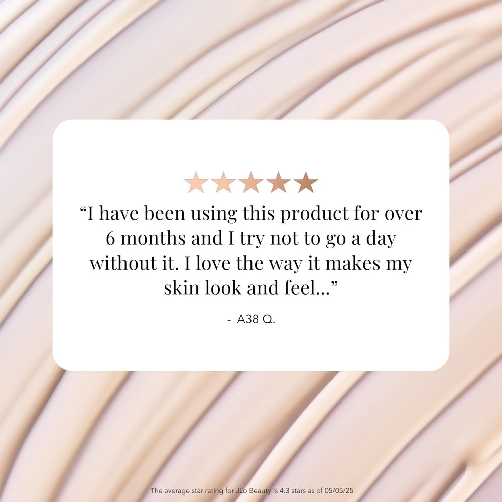 JLO Beauty Brightening Serum packaging shines on vanity, suggesting premium care.
