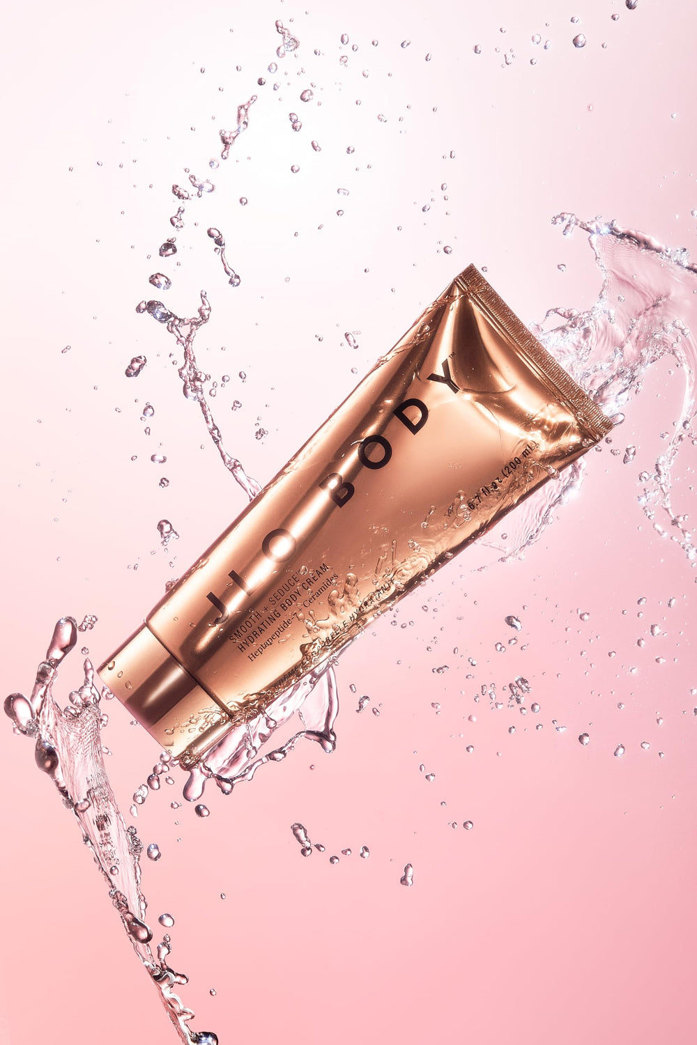 JLO Beauty Daily use application shot suggesting easy massage for smooth skin