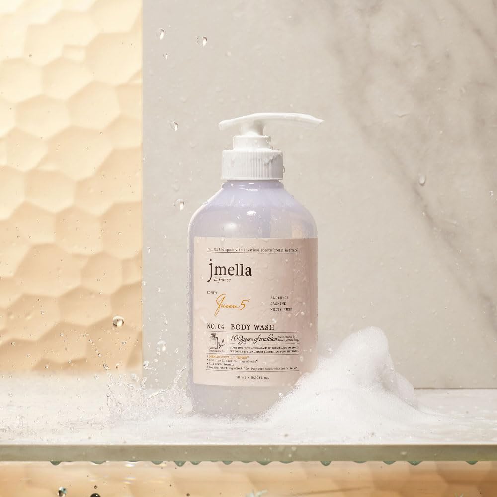 jmella Queen5 Body Wash being poured to reveal creamy lather