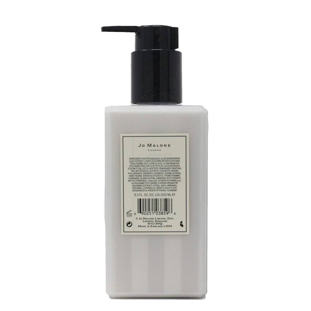 Jo Malone Lime Basil & Mandarin bottle pour, delivering silky hydration and gentle fragrance