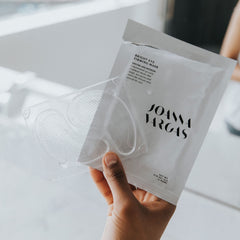 Joanna Vargas tray removal and patch placement for quick travel skincare.