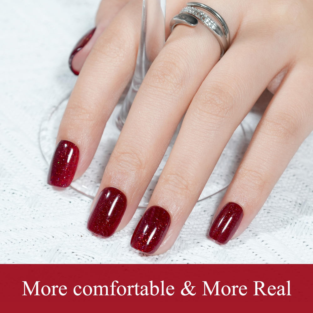 Jofay Fashion pink glitter nails add a playful festive touch.