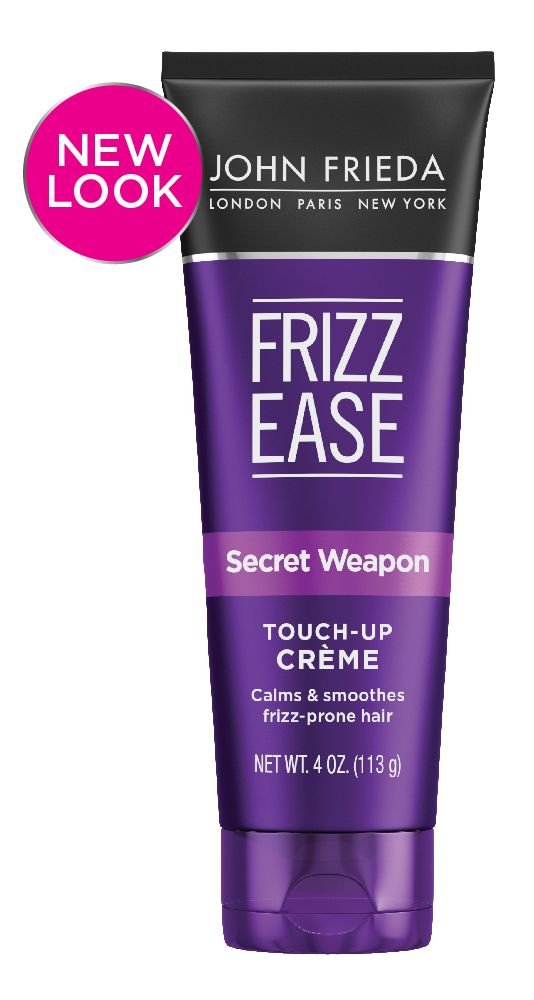 John Frieda Frizz Ease Touch-Up Creme compact in a handbag for quick frizz control