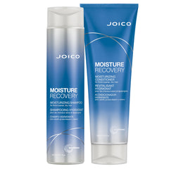 Joico Moisture Recovery shampoo bottle pour delivering intense hydration to dry hair.