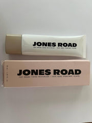 Jones Road Just Enough Porcelain bottle delivering lightweight hydration and natural coverage.