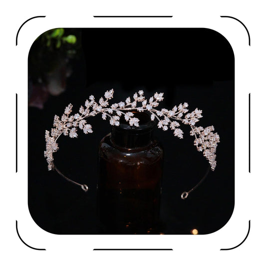 Jorsnovs rose gold tiara close-up with CZ crystals for bridal sparkle