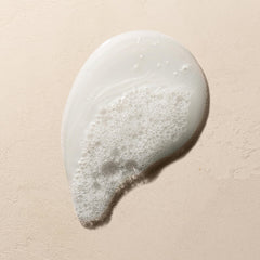 Josie Maran Argan Moisture Plump Shampoo close-up of ingredients highlights a cruelty-free formula.