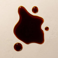 Josie Maran Argan Oil bottle showing hydrating tan development.
