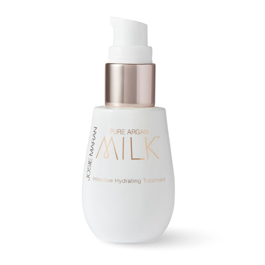 Josie Maran Pure Argan Milk bottle close-up for hydrated, radiant skin.
