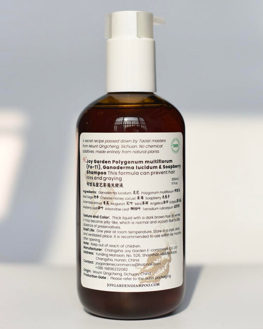 Joy Garden He Shou Wu shampoo bottle with herbal formula for daily cleansing.