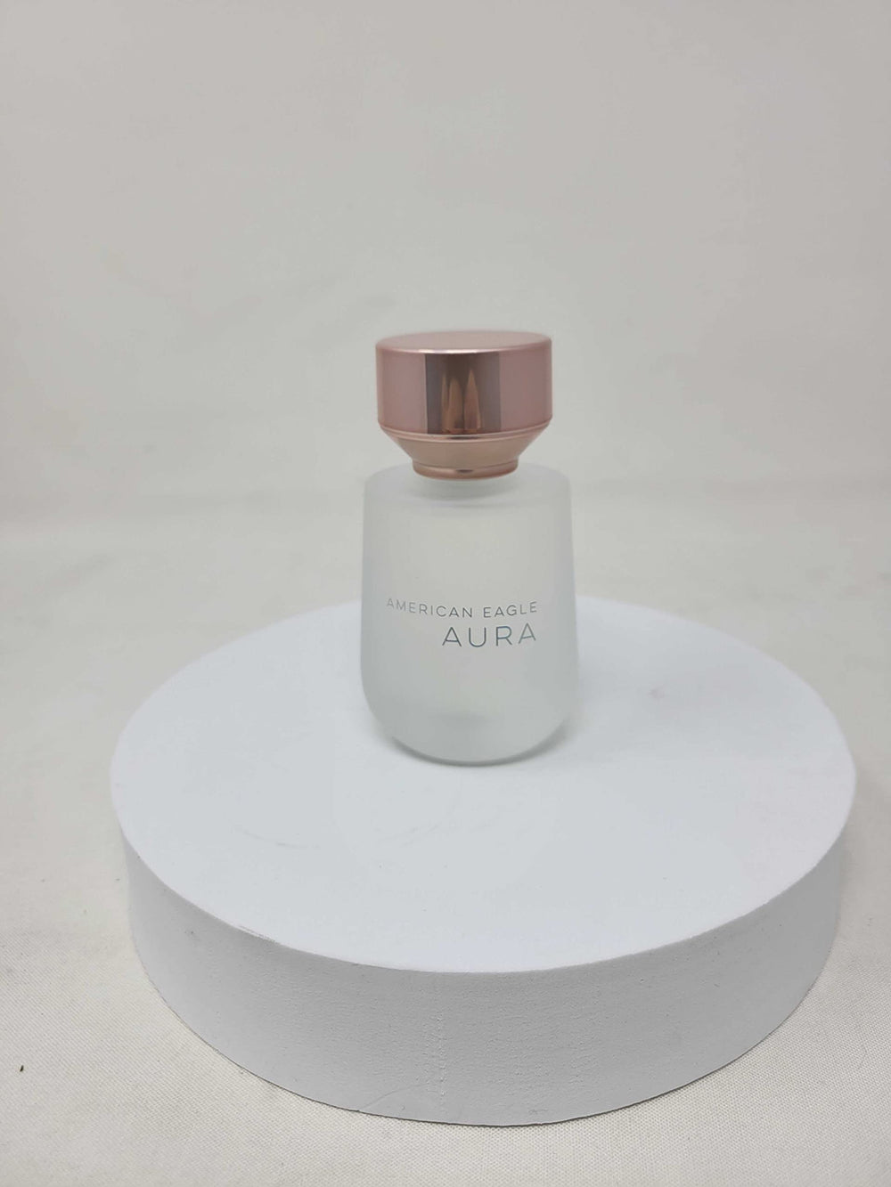 Aura EDT packaging image illustrating compact travel-friendly box.