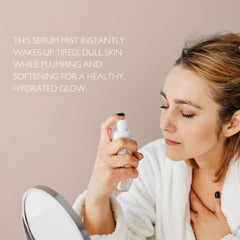 Just Us Tighten + Glow Serum Mist label close-up highlighting Argireline and botanicals.