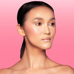 Juvia's Place soft-tulip-glow swatches on skin reveal peachy-pink radiance suitable for many skin tones.