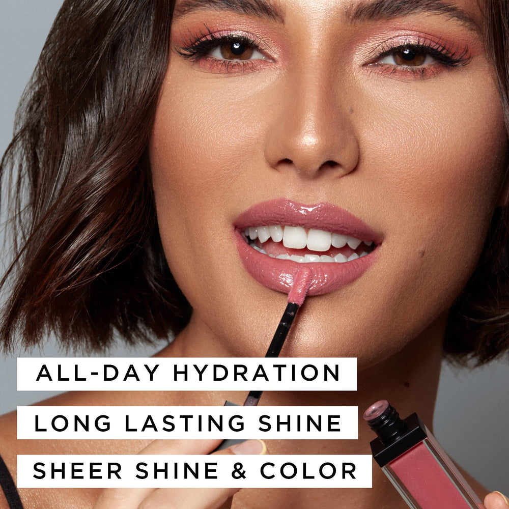 K7L Nude Pink Lip Gloss tube close-up highlights creamy texture.