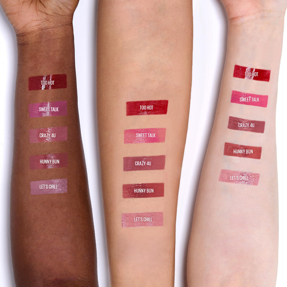 KAJA Hunny Bun shade swatch on lips shows soft nude pink.