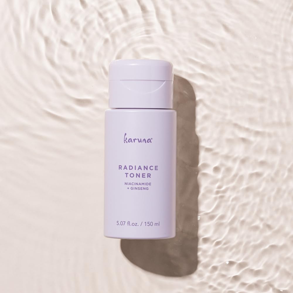 Hands applying Karuna Hydrating Face Toner during routine.