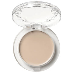 KVD Beauty Good Apple foundation balm packaging closeup for easy touch-ups and natural finish.