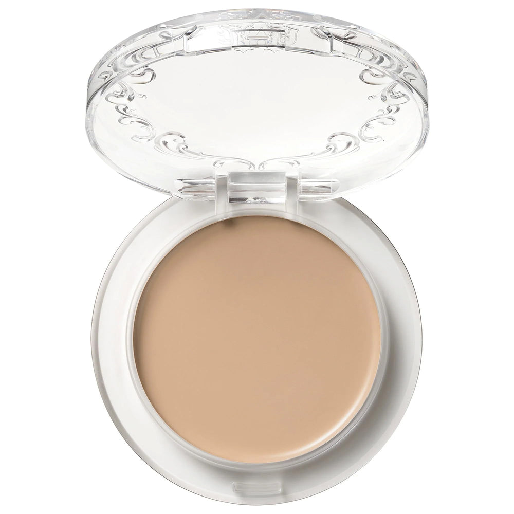Kat Von D Good Apple foundation balm close-up shows silky texture for smooth blending.