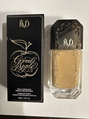 Kat Von D Good Apple serum foundation Tan 057 bottle shows radiant finish.