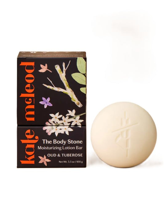 Kate McLeod Oud & Tuberose Body Stone close-up shows rich hydration.