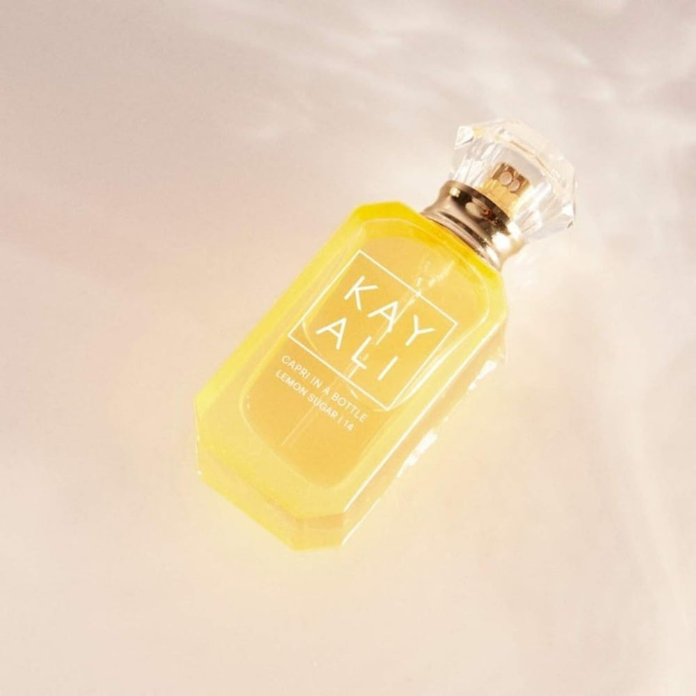 KAYALI Capri in a Bottle Lemon Sugar vanilla-praline note reveal hints at warmth.