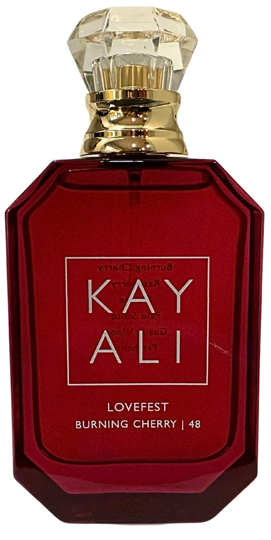 KAYALI Lovefest Burning Cherry bottle close-up showing rich ruby tones for evening glamour