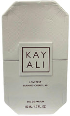 KAYALI Lovefest Burning Cherry bottle spray demonstrates smooth application and convenience