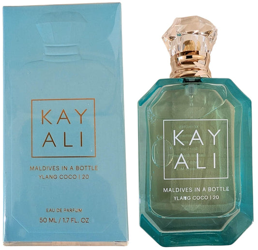 Kayali Maldives bottle with aquamarine glass cap, ocean-inspired elegance for everyday wear.
