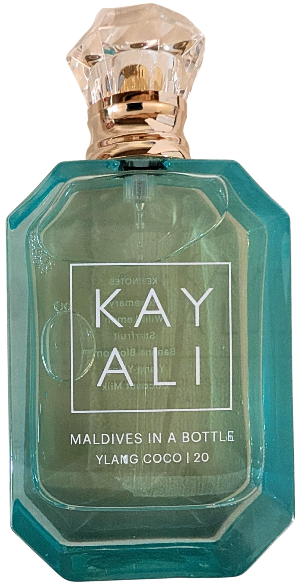 Kayali Maldives flower heart of ylang-ylang and coconut, lush floral softness and depth.