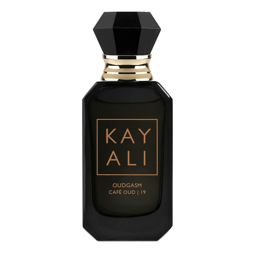 Kayali Oudgasm Café Oud application tip for easy spray