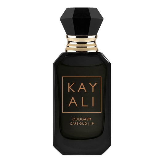 Kayali Oudgasm Café Oud travel spray bottle ready for on-the-go fragrance