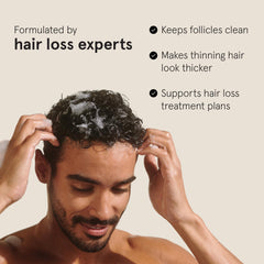 Keeps shampoo bottle highlights green tea and caffeine ingredients for scalp care.
