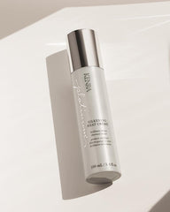 Kenra Platinum Silkening Heat Crème applied to damp hair for easier styling