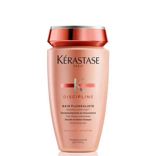 Kerastase Discipline shampoo bottle shows smoothing, frizz control benefits.