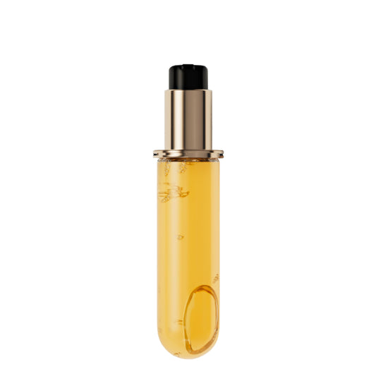 Kerastase Elixir Ultime oil on-gloss application delivering radiant shine.
