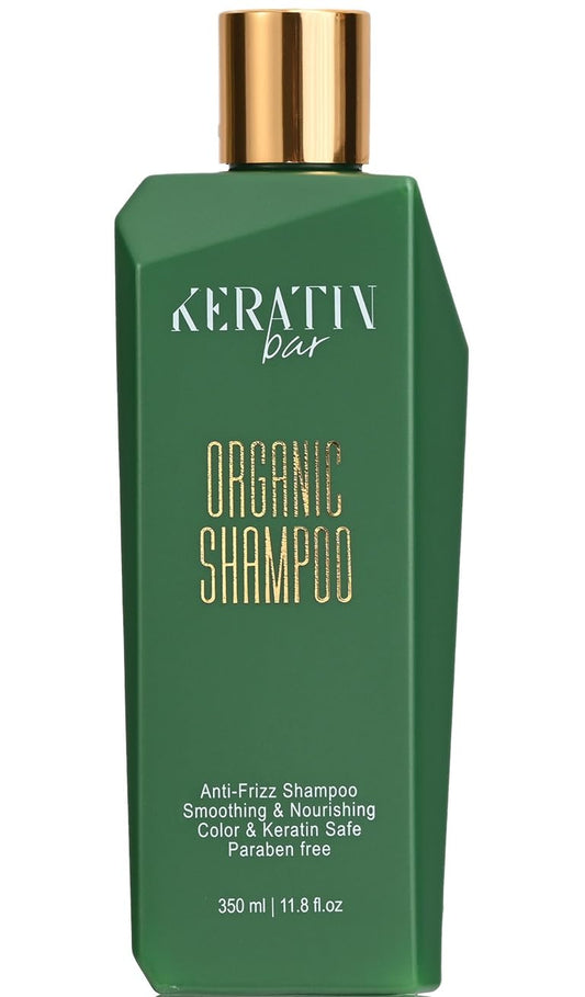 KERATIN BAR Organic Shampoo bottle closeup highlighting smoothing and frizz-control benefits.