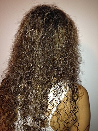 Close-up of Keratin Express Plus 4 oz bottle with pump for easy application.
