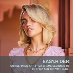 KEVIN.MURPHY EASY.RIDER anti frizz cream dispense pump for easy application and control.
