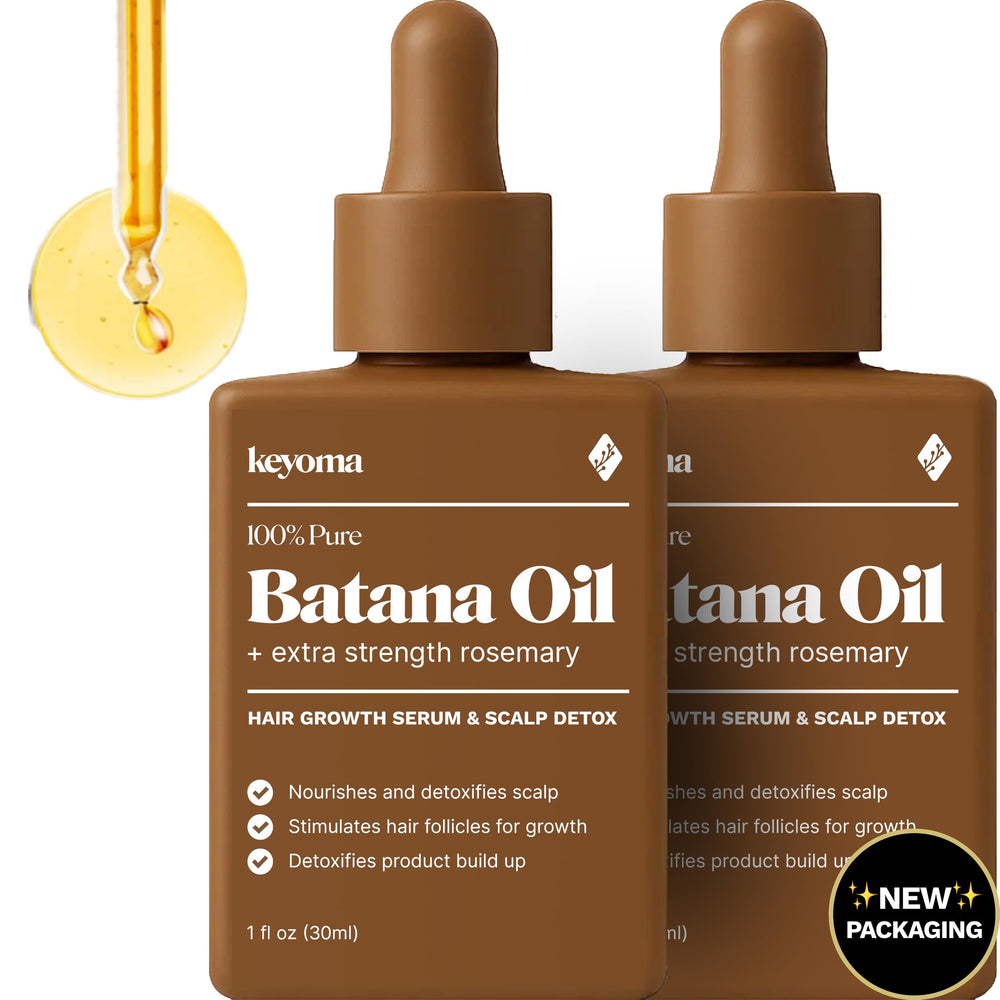 Keyoma Batana Oil bottle pour showcases pure organic formula for hair nourishment.