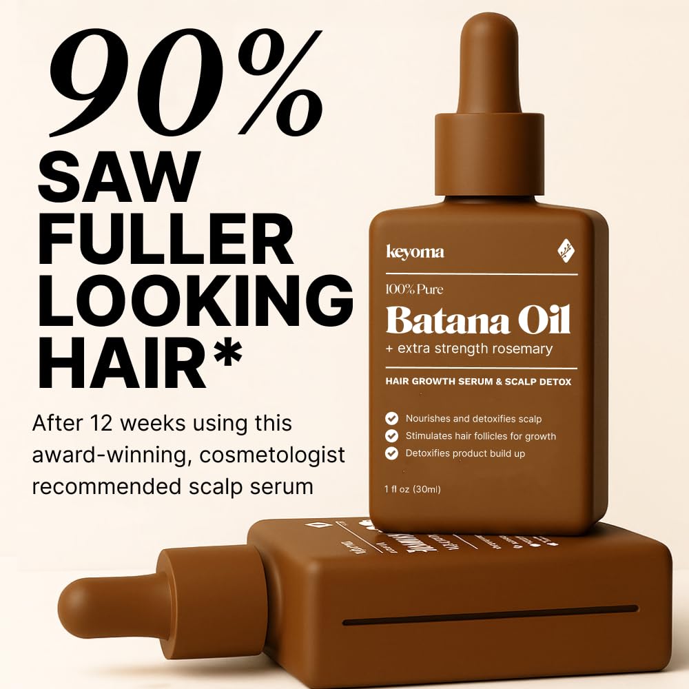 Keyoma Batana Oil applied to hair strand highlights shine and moisture.